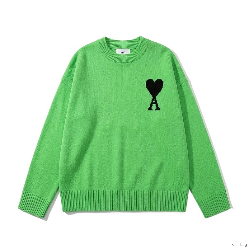 AMIRI's trendy and cool green sweater with a heart pattern.