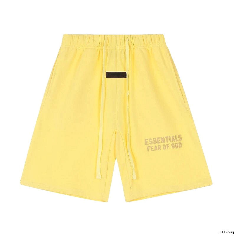 ESSENTIALS minimalist style yellow shorts