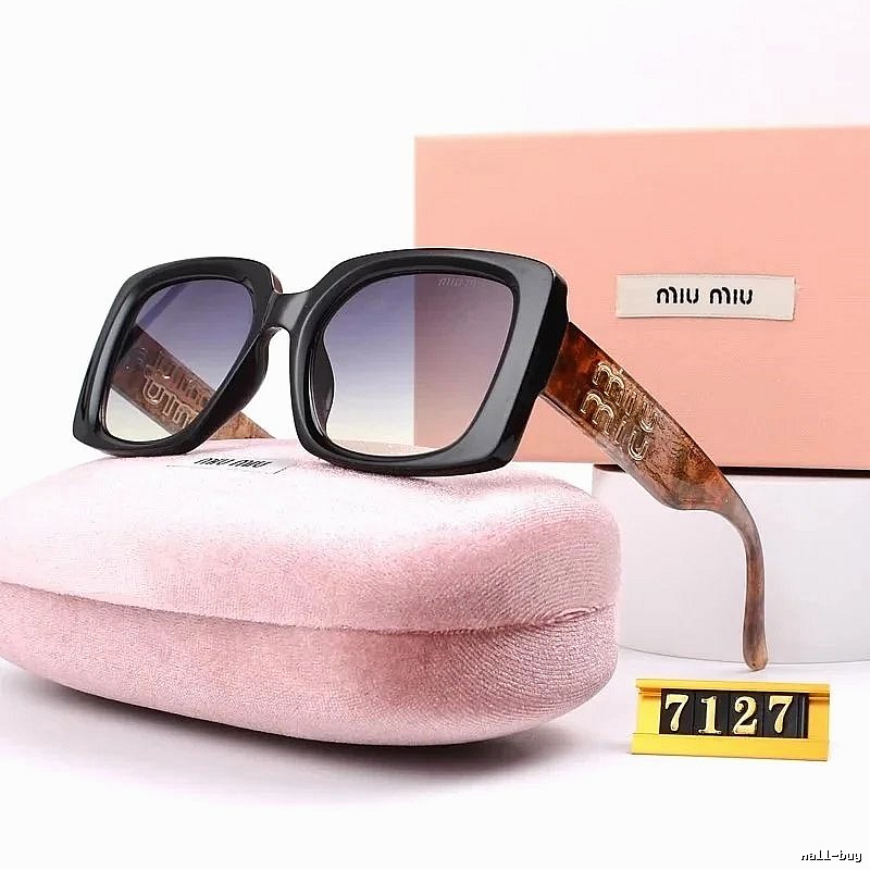 Miu Miu Gift Ready Oversized sunglasses Black Oval Sunglasses with Standout Detail
