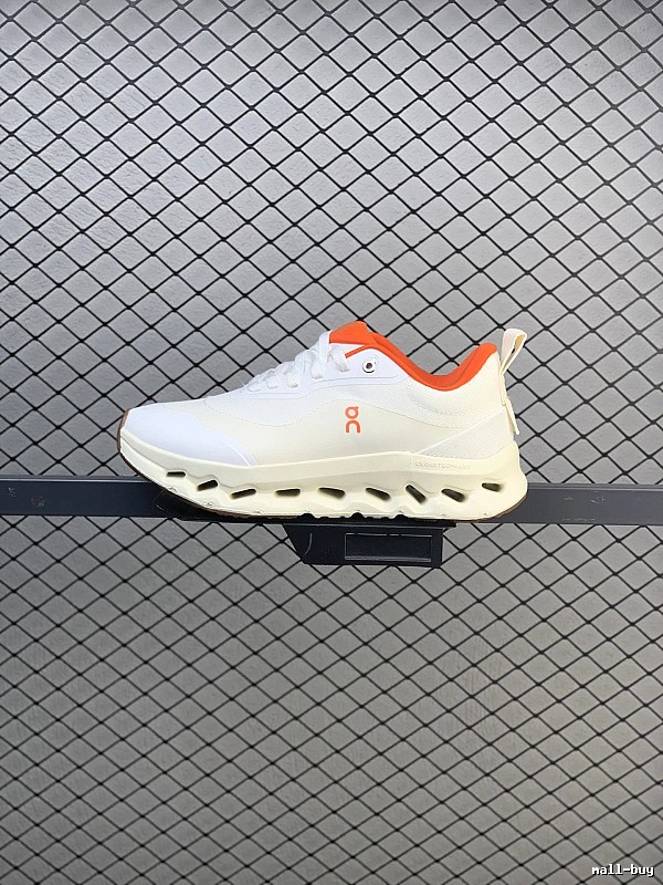 On Cloud Runners in White and Orange with Dynamic Sole Shape