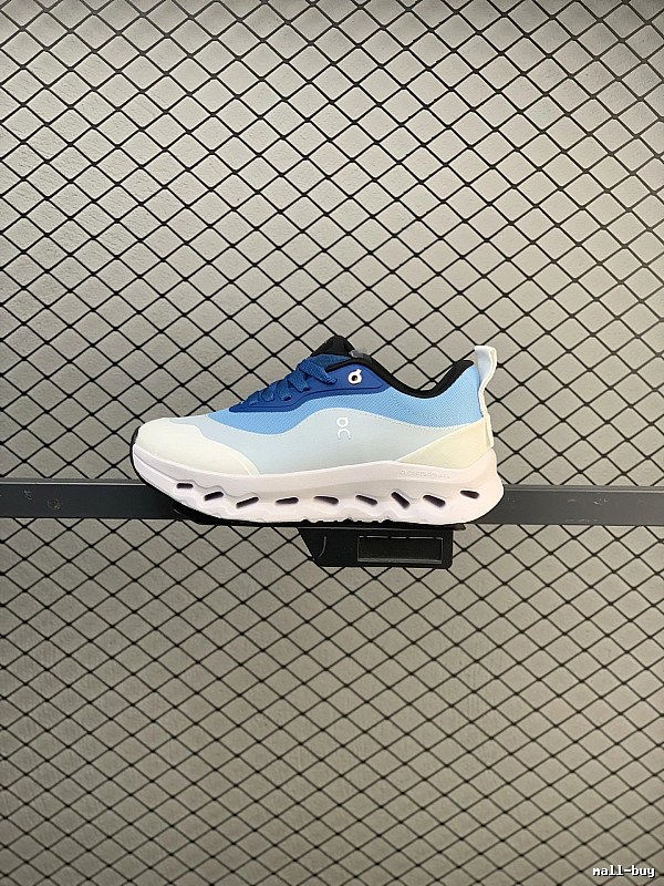 On White and Blue Cloud Runners Highlighting Open Mesh Panels